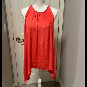 Beachy feels, vibrant coral flowing top by Michael Kors